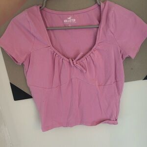 Hollister Pink baby tee with bow.